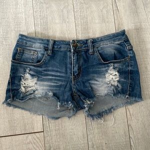 Short ripped shorts